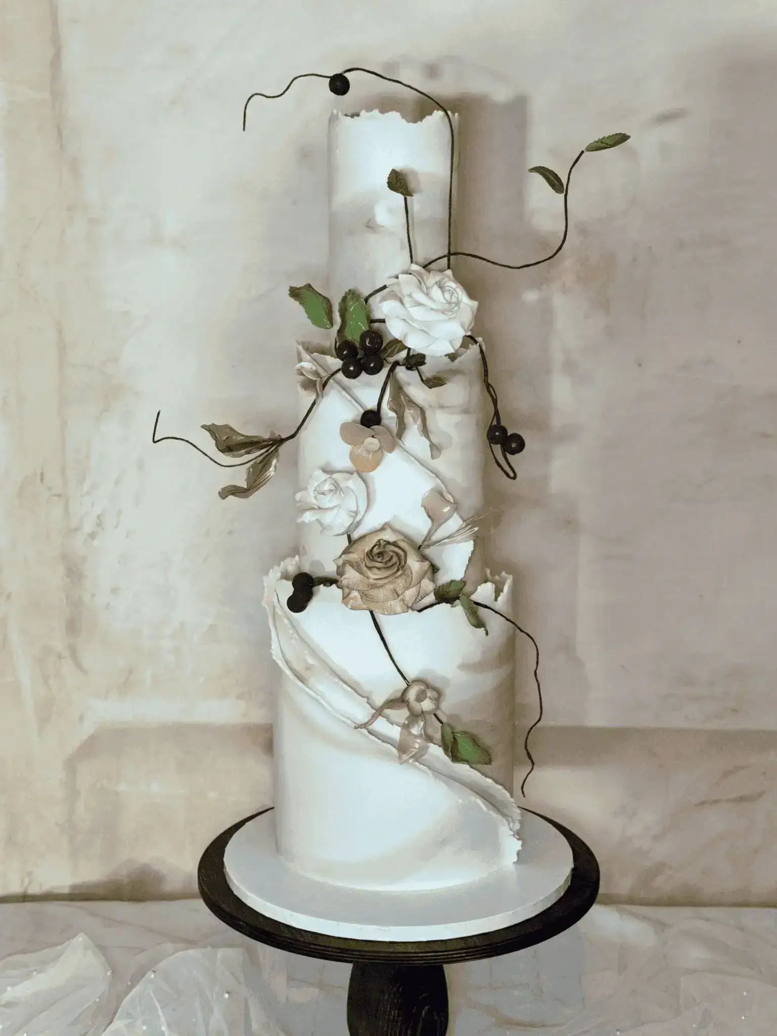 Luxury gold and white tiered wedding cake